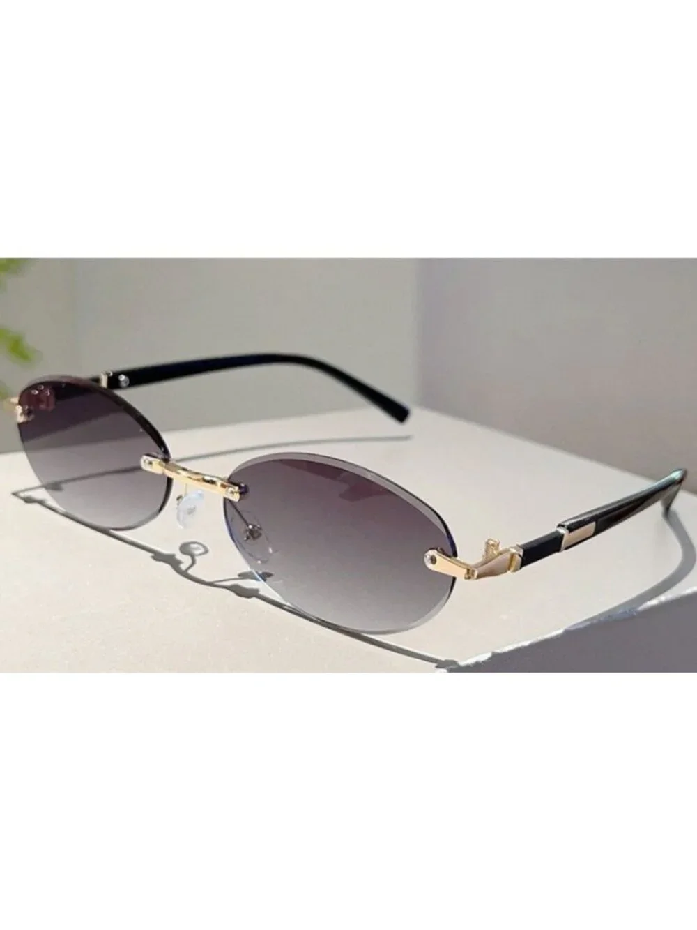 Oval Rimless Grey Lens Sunglasses With Gold & Black Metal Frame